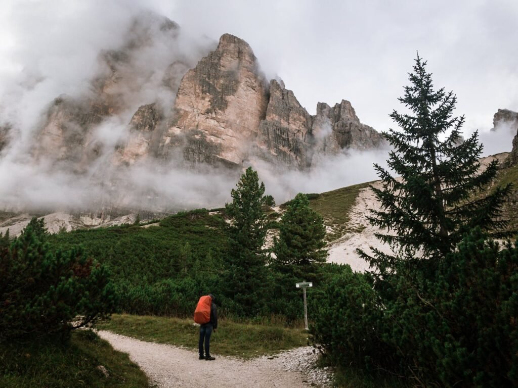 A person standing at a crossroads