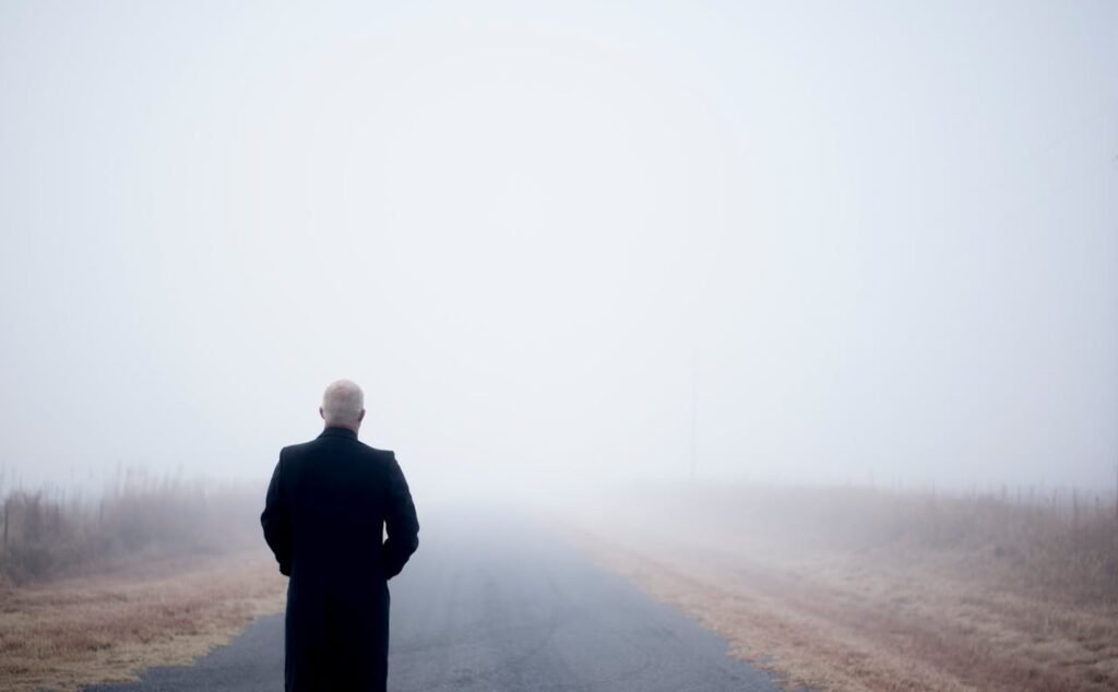 standing confidently alone on a quiet path