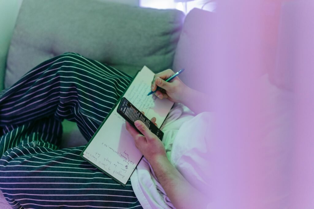 A person walking confidently on a clear path or writing a life plan in a notebook