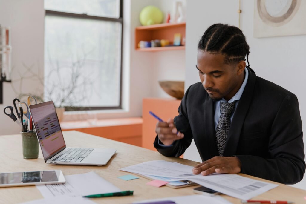 A professional walking up steady steps or reviewing a career plan at a desk